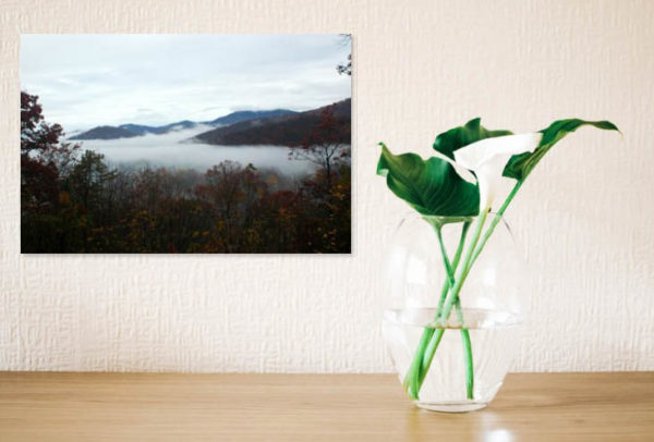 Good Morning Sunshine is photography of a winter view. Black Mountain above the clouds in a room.