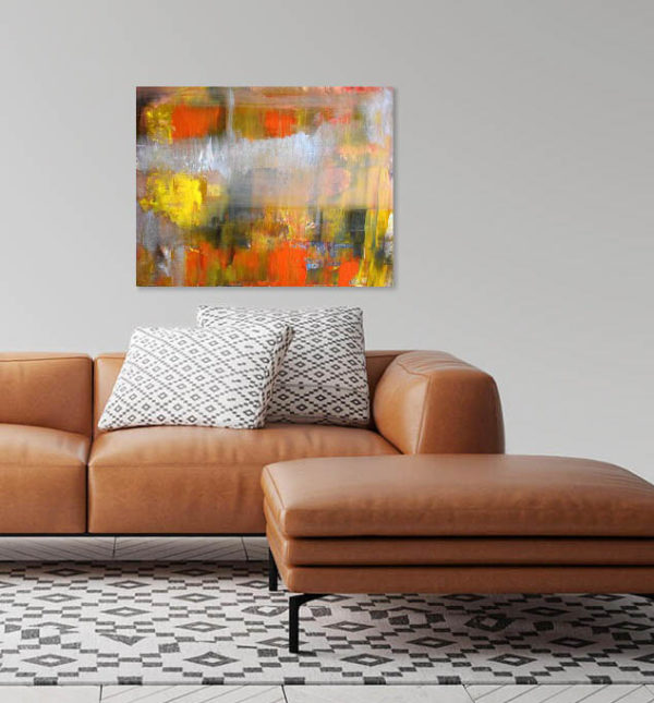 earthy colors, orange, yellow over a sofa. The Prophet abstract painting.