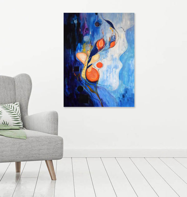 Uplifting blues in abstract contemporary painting next to a chair- Sourcing Goodness